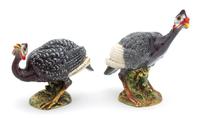 A Pair of Polychromed Ceramic Models of Wild Fowl Height or largest 11 1/2 inches. — 20TH CENTURY