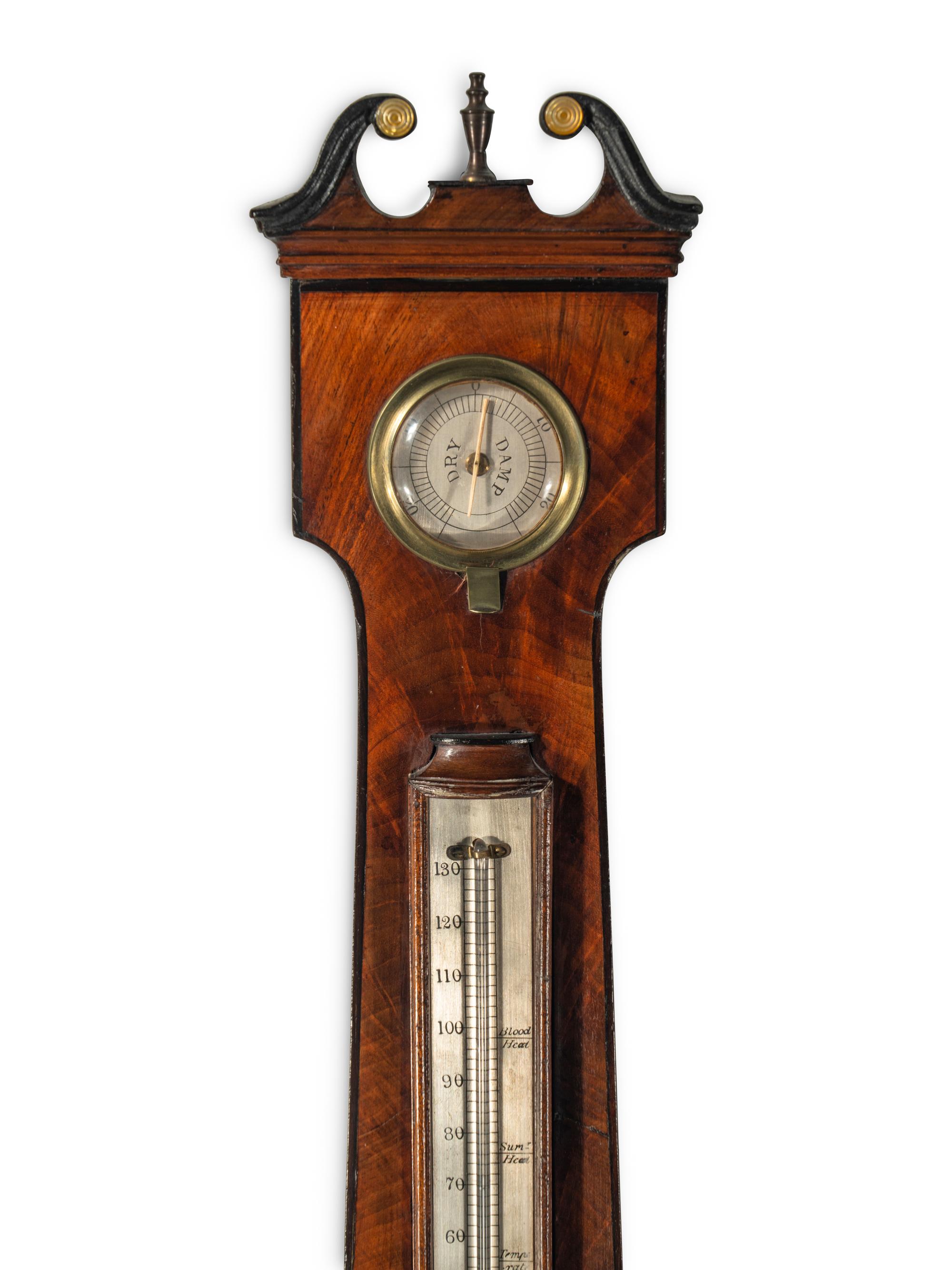 An English Mahogany Wheel Barometer