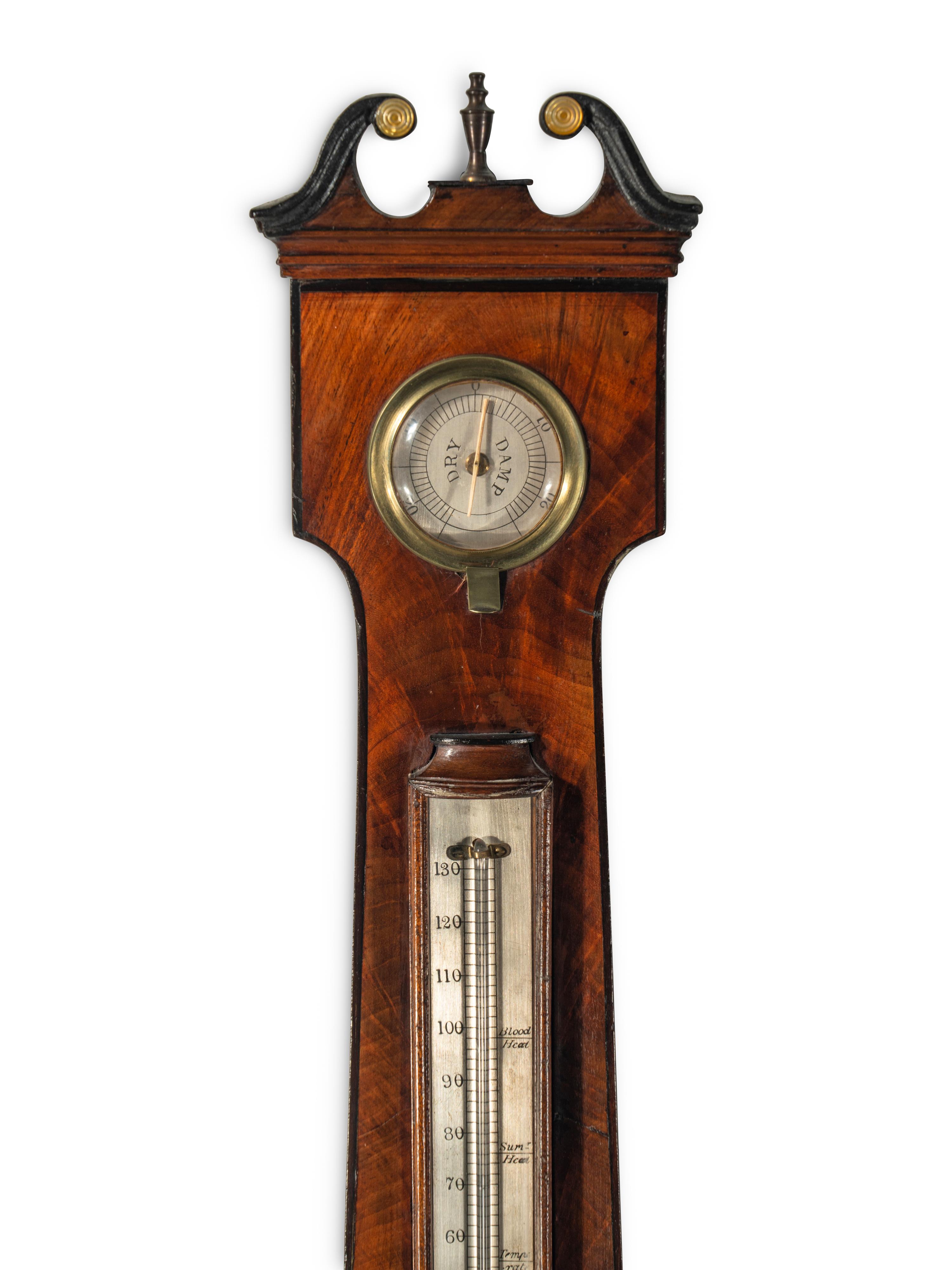 An English Mahogany Wheel Barometer