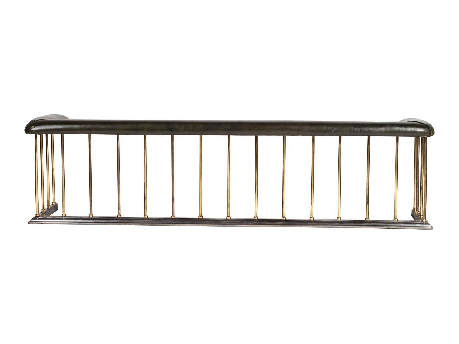 A Brass and Leather Club Fireplace Bench