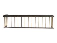 A Brass and Leather Club Fireplace Bench