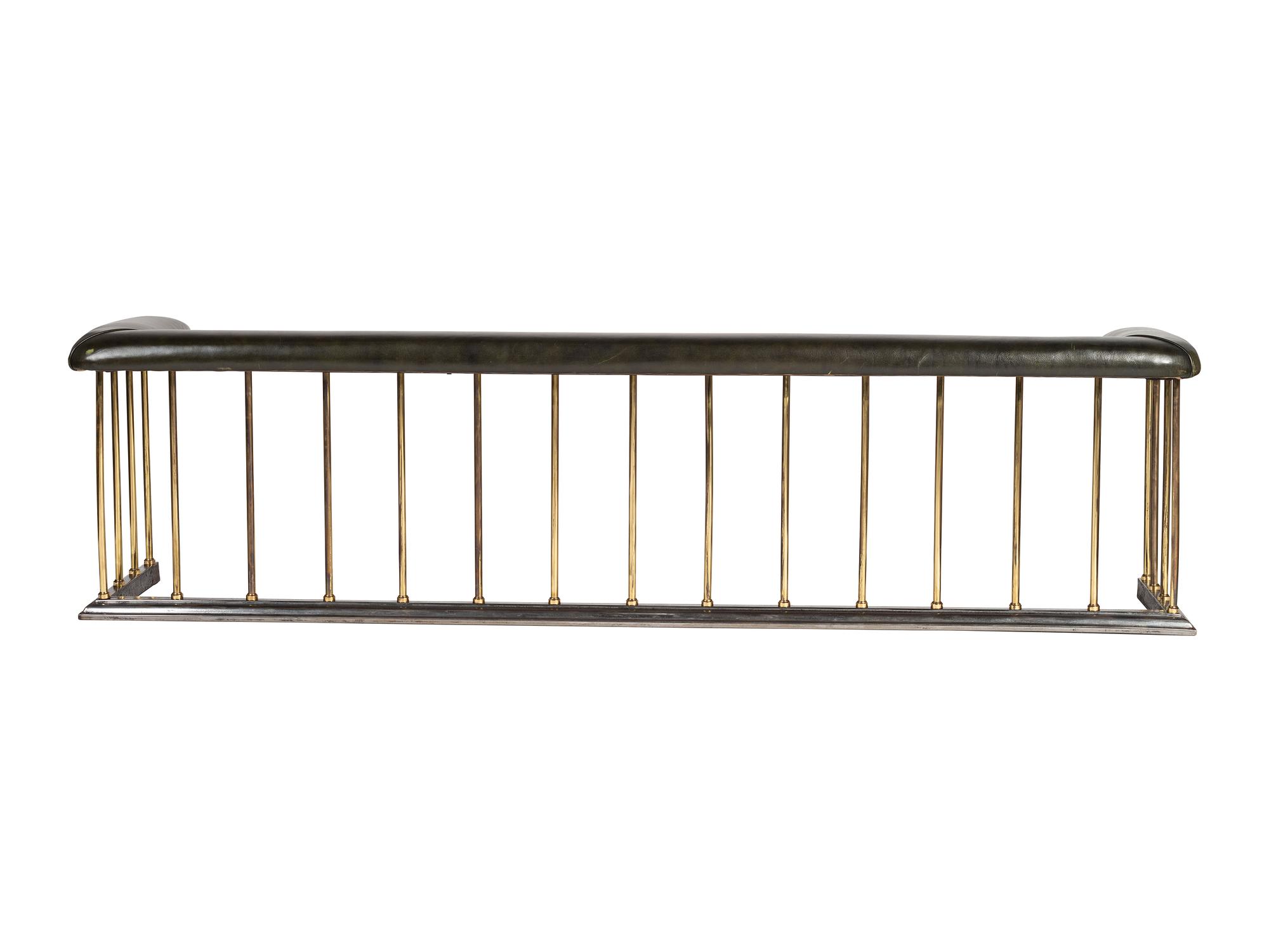 A Brass and Leather Club Fireplace Bench