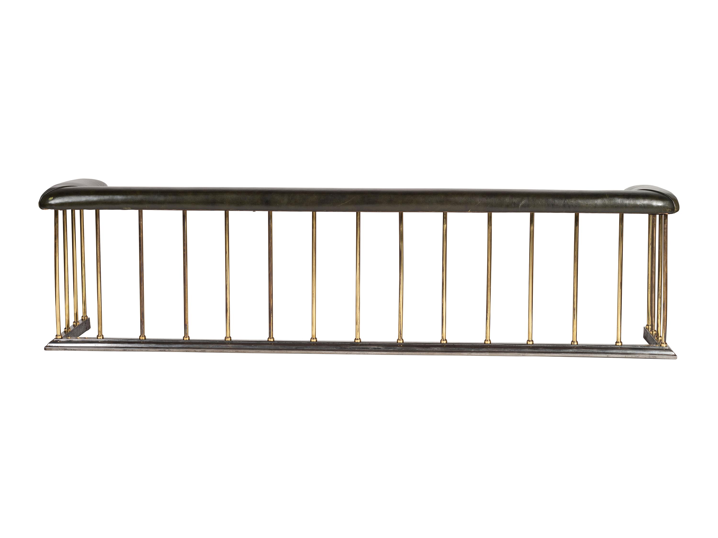A Brass and Leather Club Fireplace Bench