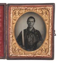 [CIVIL WAR]. Sixth plate tintype of an armed CSA soldier wearing the Alabama "Map on Tree" belt buckle.