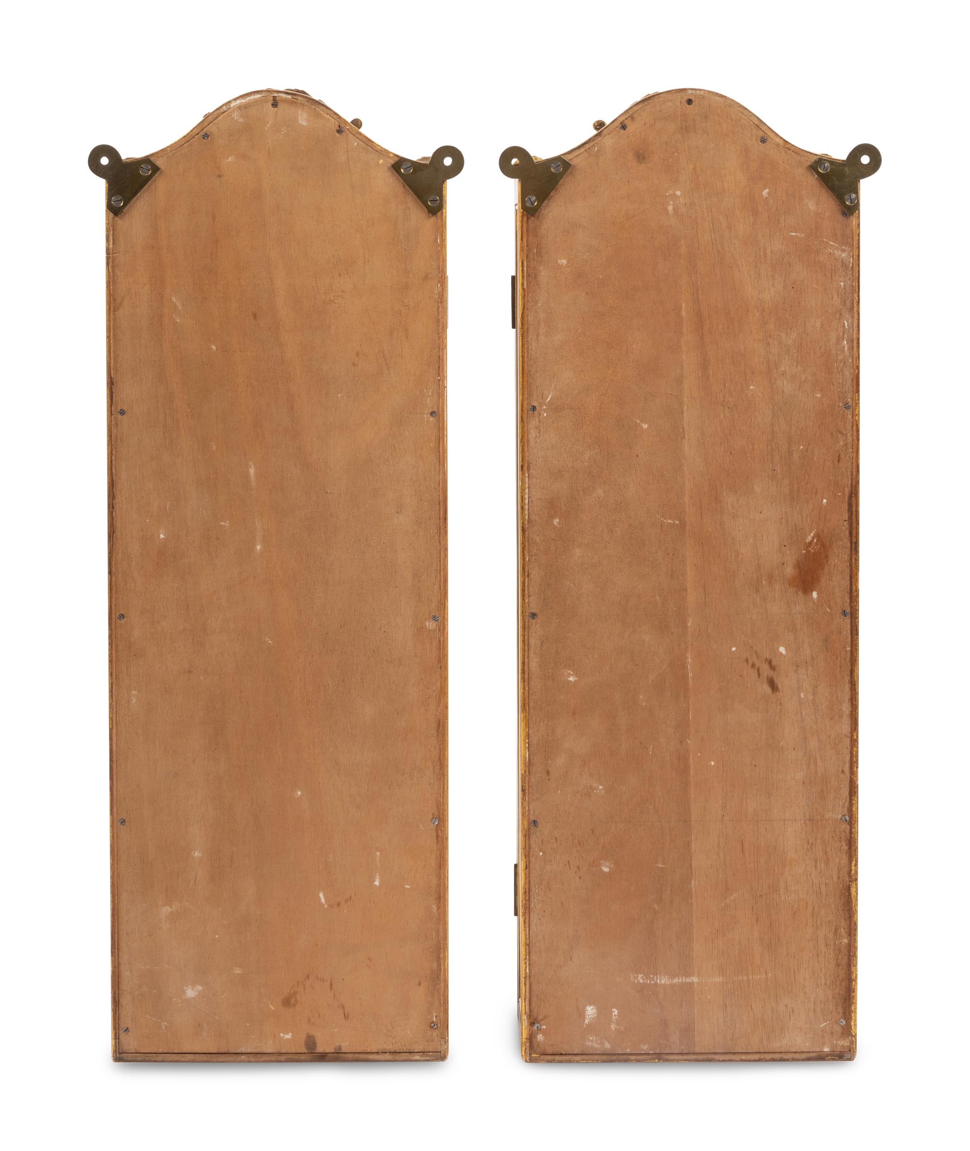 A Pair of Italian Giltwood Hanging Vitrine Cabinets