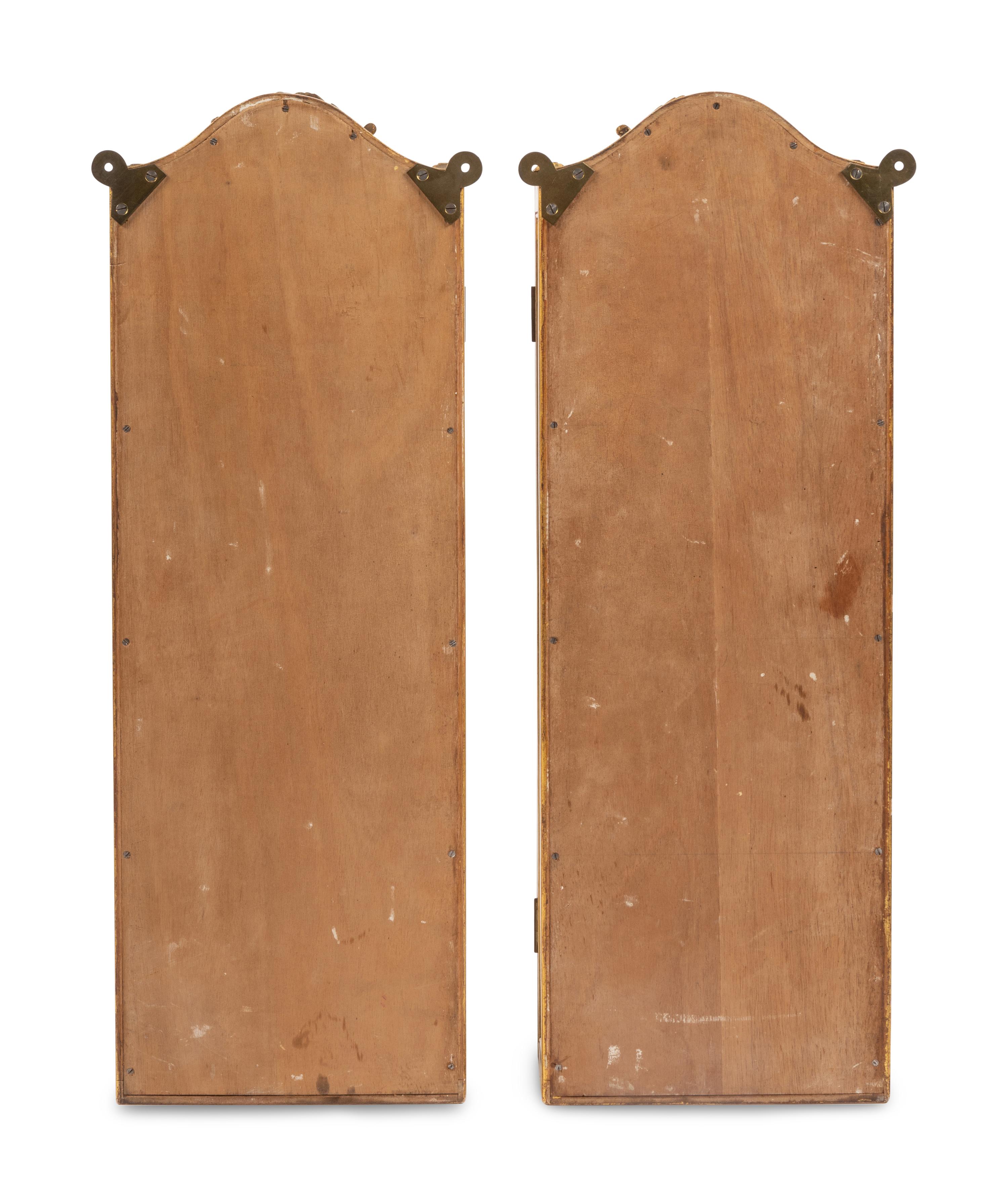 A Pair of Italian Giltwood Hanging Vitrine Cabinets
