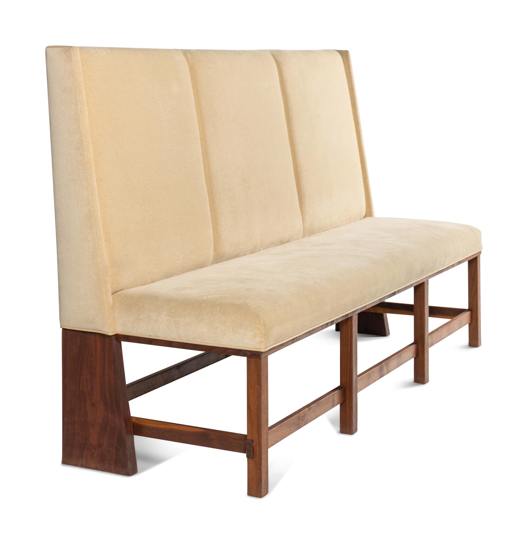 A Custom Upholstered Walnut Banquette