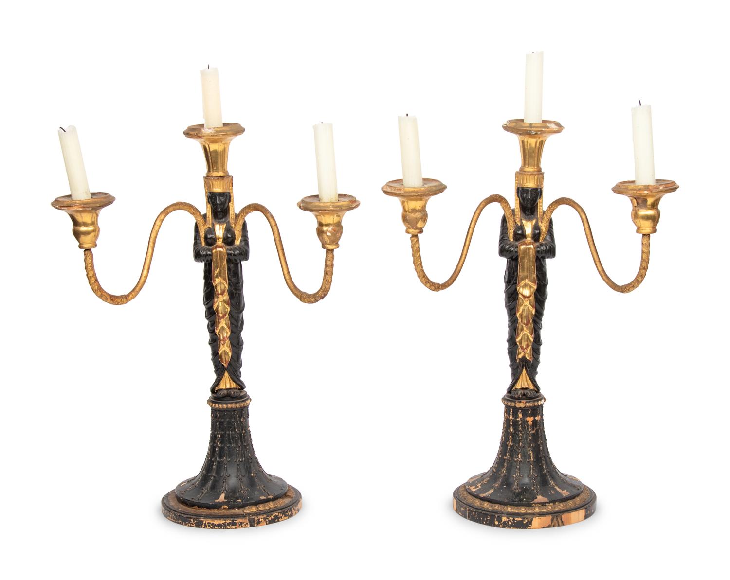 A Pair of Empire Style Painted and Parcel Gilt Candelabra