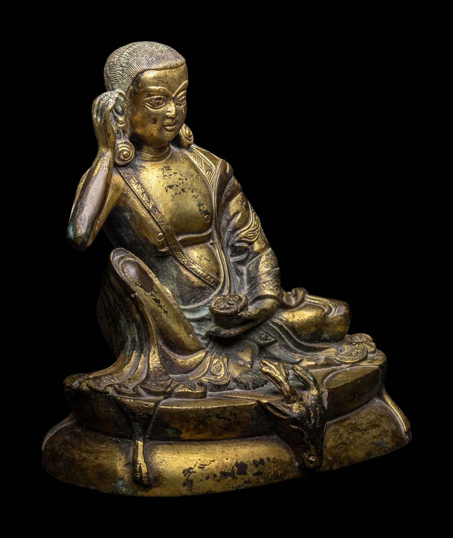A Sino-Tibetan Gilt Bronze Figure of Milarepa 銅米拉日巴尊者像