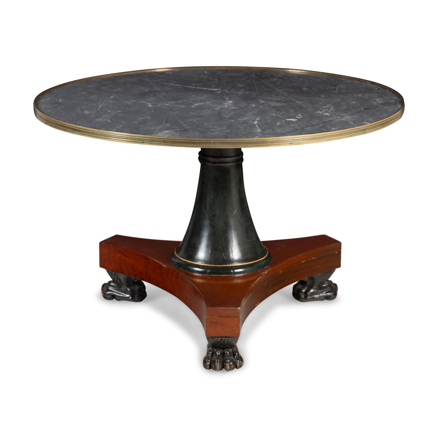 A Russian or Baltic Neoclassical Part-Ebonized Mahogany Marble-Top Center Table