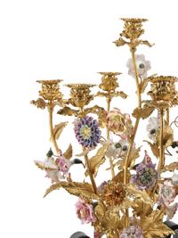 A Pair of Large Continental Porcelain and Gilt Bronze Seven-Light Candelabra