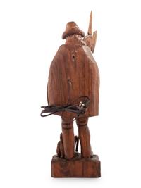 A Black Forest Carved Walnut 'Night Watchman' Lamp