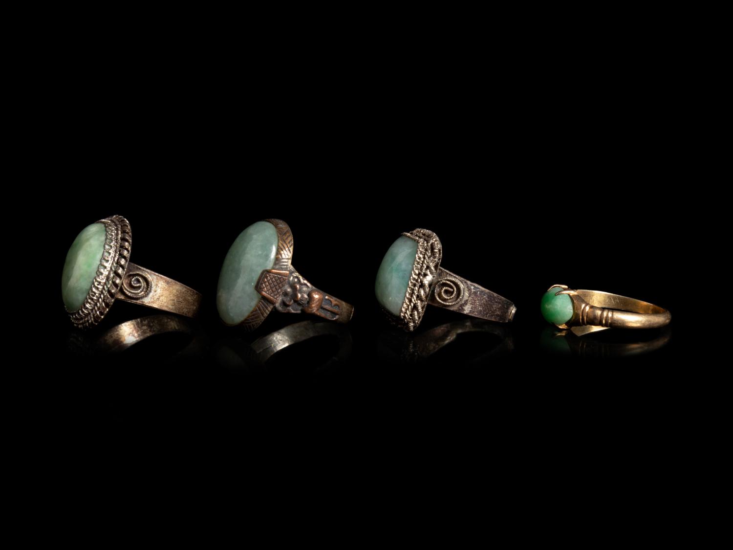 Four Chinese Jadeite Inset Metal Rings