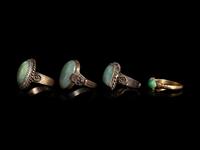 Four Chinese Jadeite Inset Metal Rings