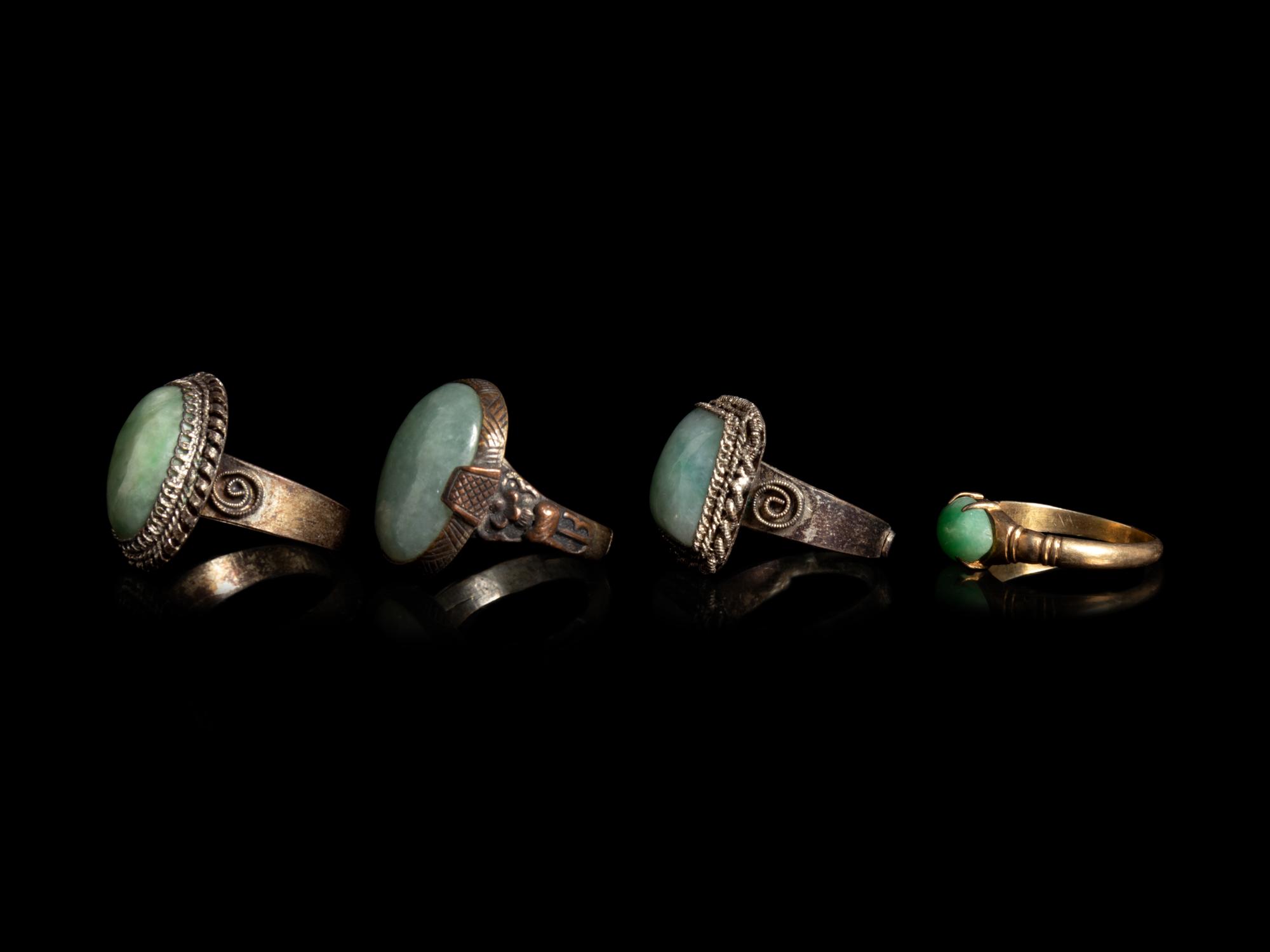 Four Chinese Jadeite Inset Metal Rings