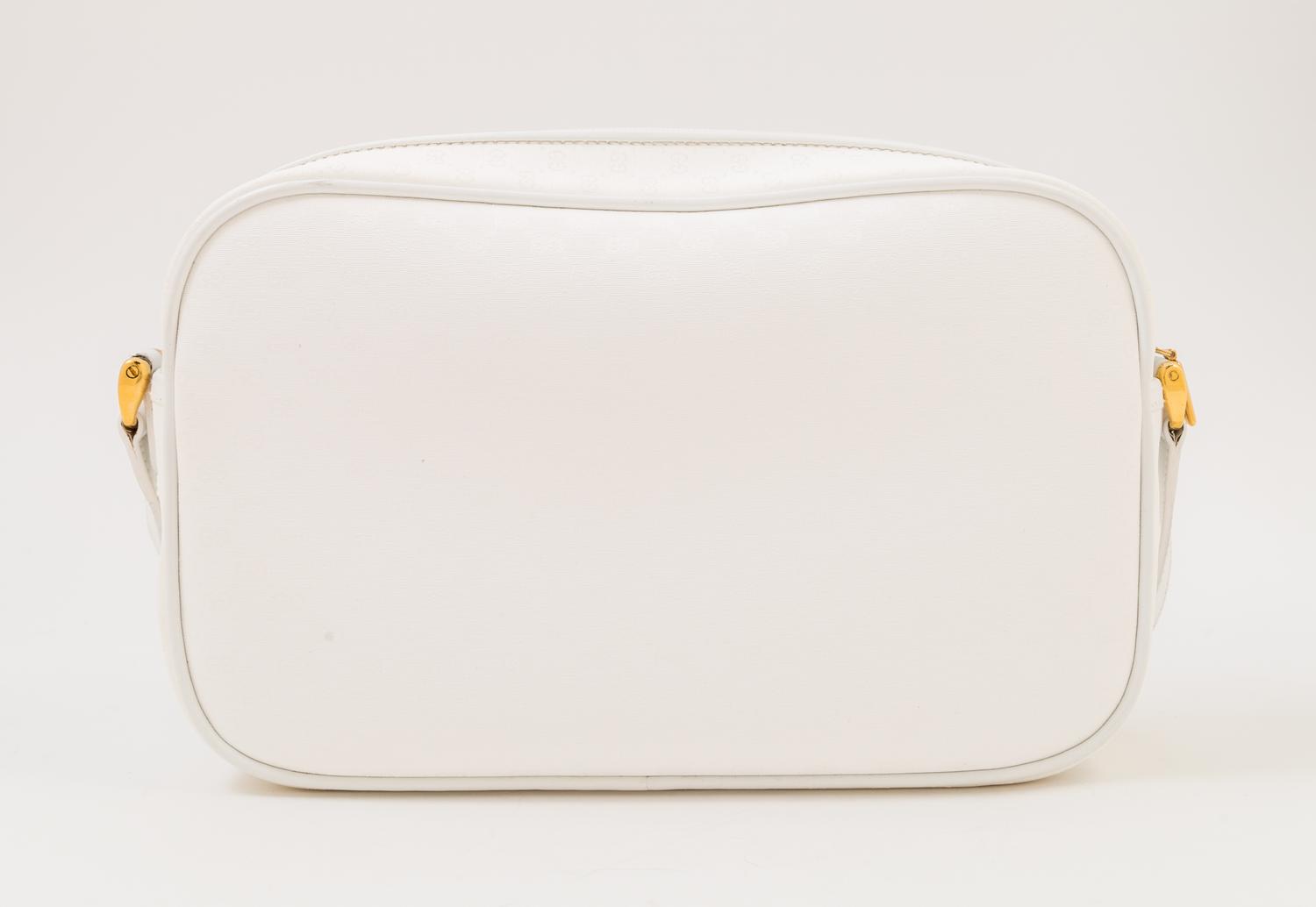 A Gucci White Monogram Canvas Handbag, 10" x 6.5" x 3"; Strap drop: 19".