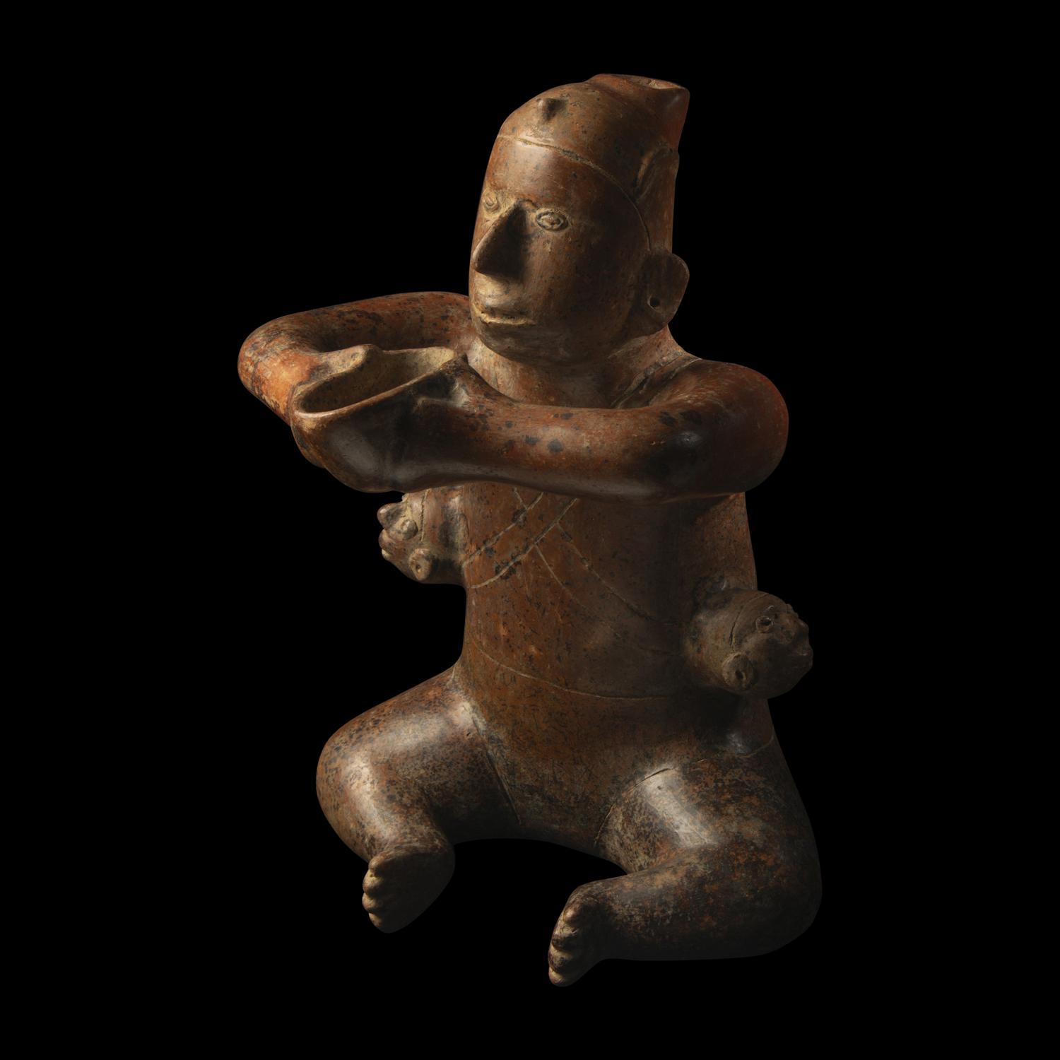 A Colima Terracotta Seated Figure