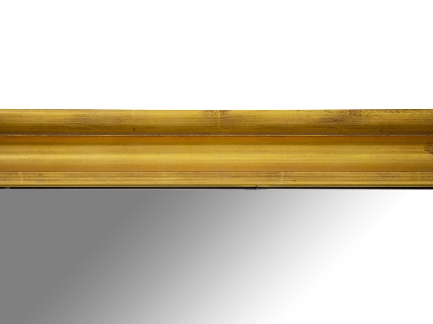 An Oversized Giltwood Mirror — 20th/21st Century