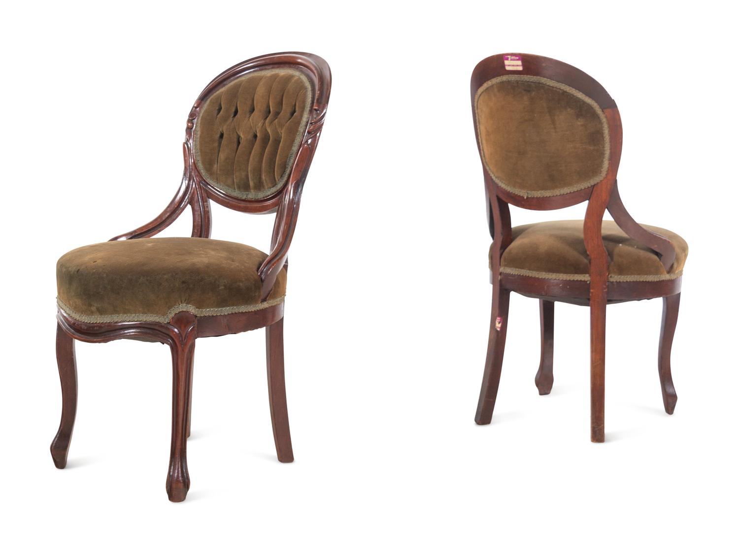 A Pair of Victorian Rococo Revival Walnut Side Chairs and a Victorian Side Table
