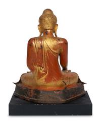 A Burmese Gilt and Red Lacquered Bronze Seated Buddha
