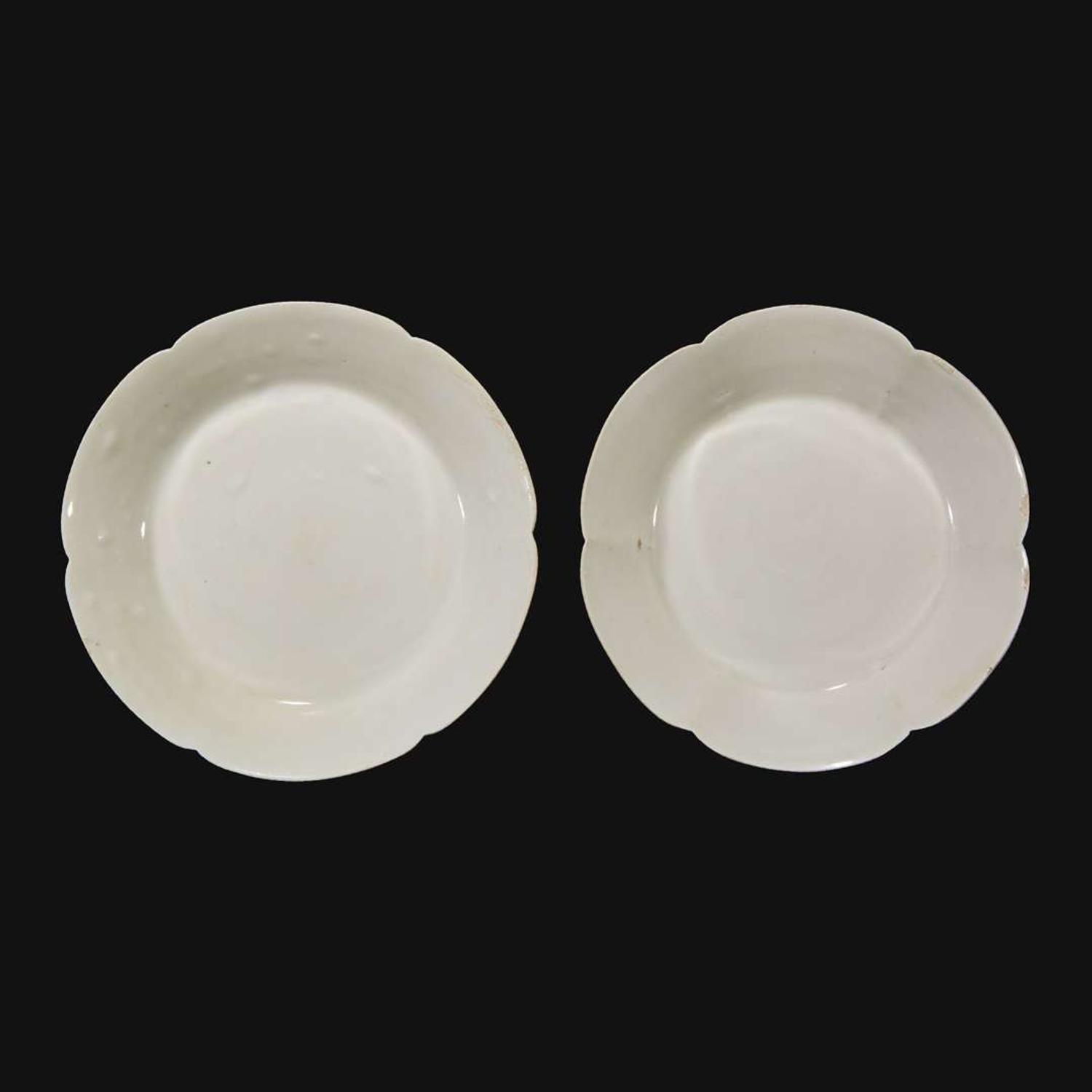 An associated pair of Chinese whiteware floriform dishes Song dynasty