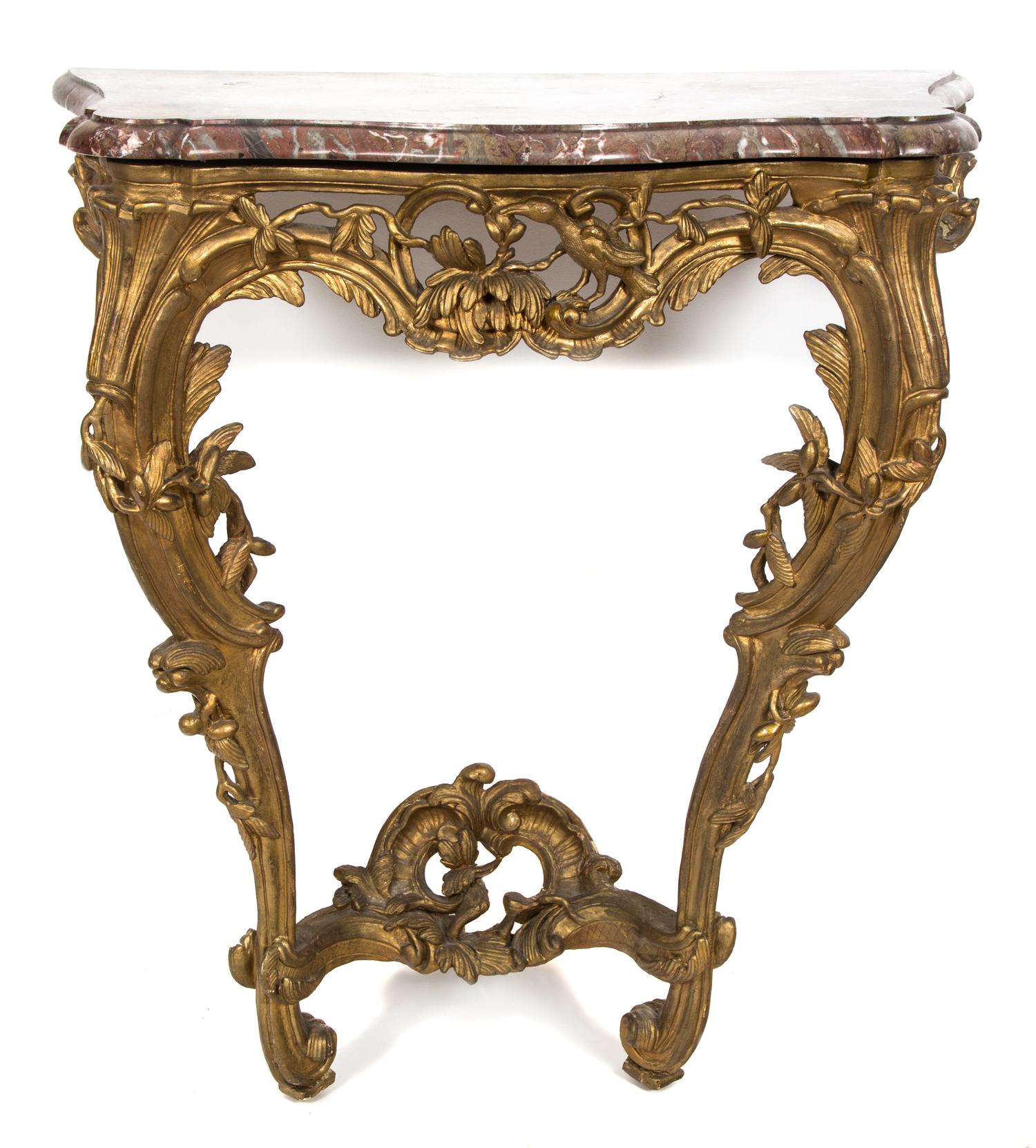A French Carved and Gilt Console Table Height 34 1/2 x width 31 x depth 19 1/4 inches. — 18TH CENTURY