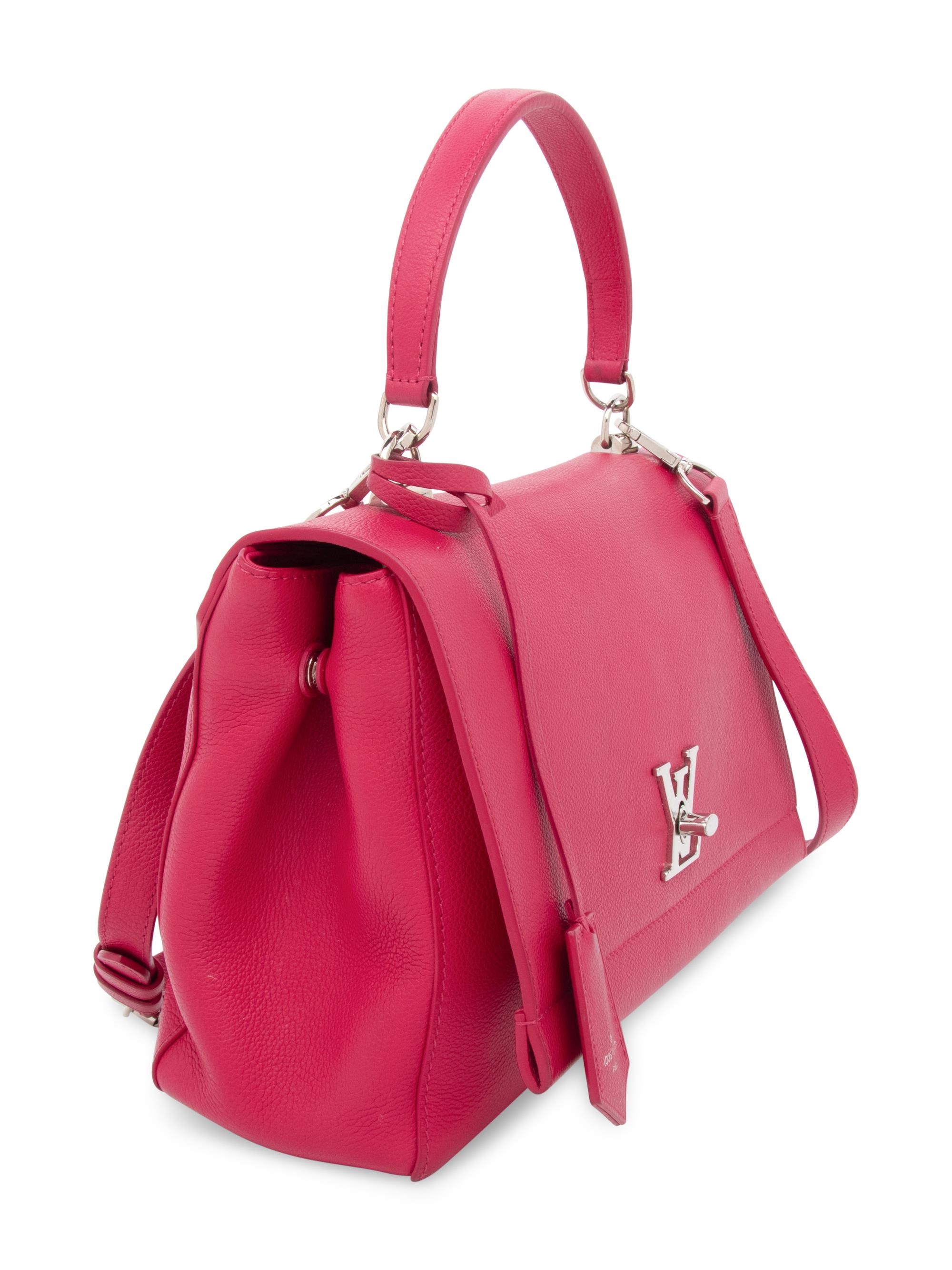 LOUIS VUITTON, LOCK ME II BAG