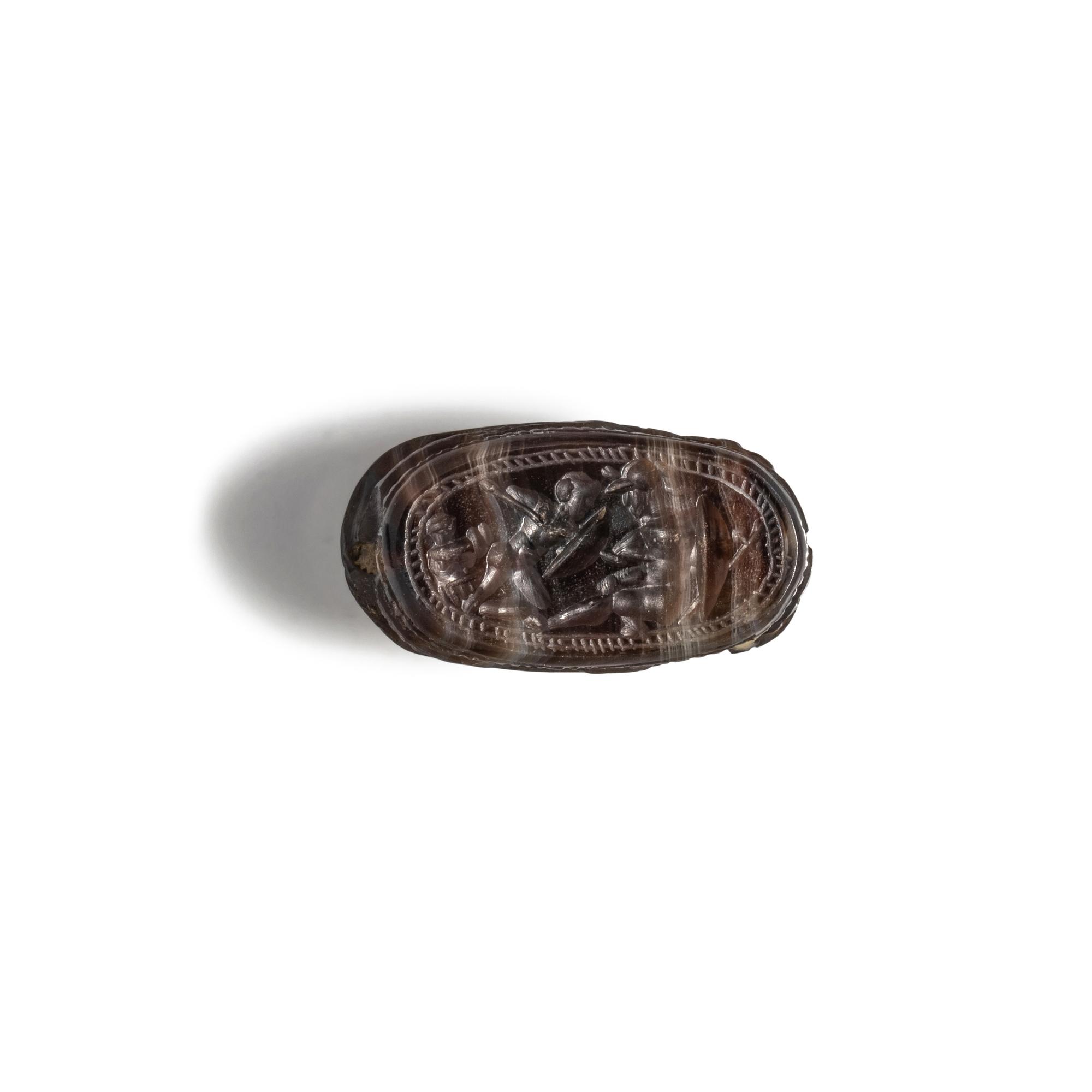 An Etruscan Banded Agate Scarab with Heracles Fighting Kyknos