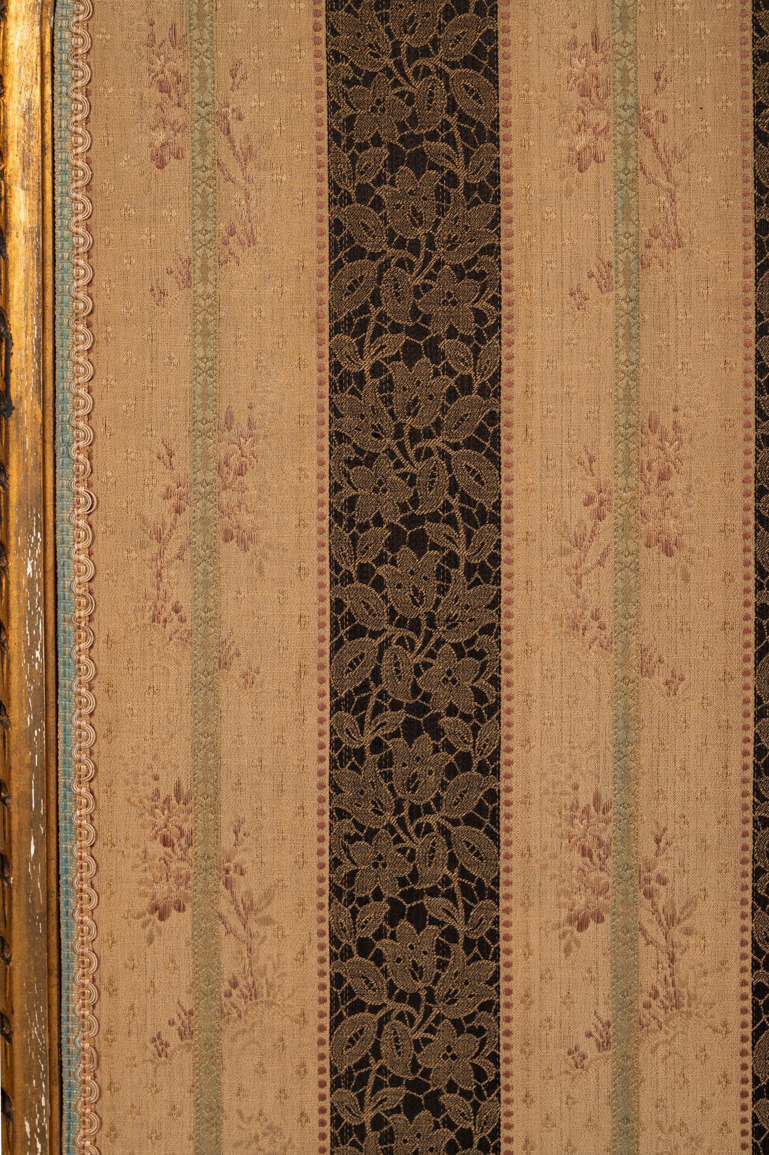 A Louis XVI Style Giltwood Three-Panel Floor Screen