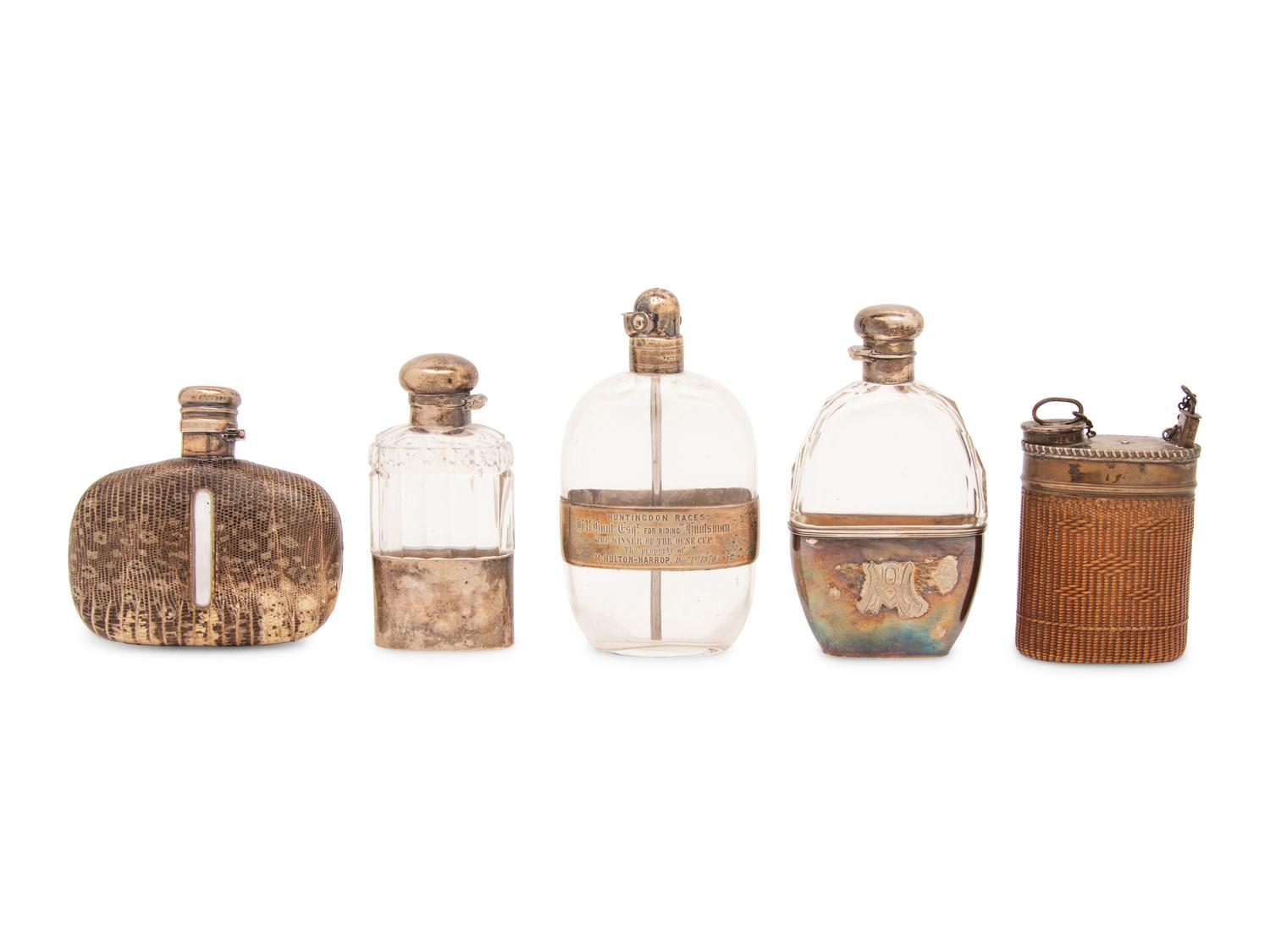A Group of Five Silver, Reed and Snakeskin Mounted Flasks