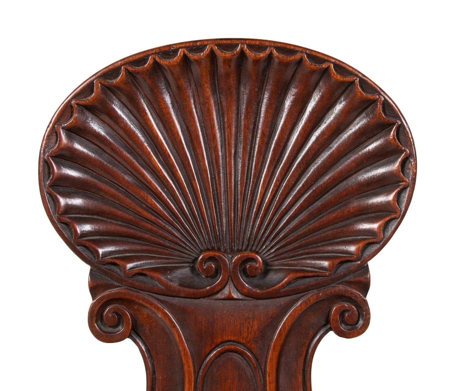 A Pair of Regency Style Mahogany Hall Chairs