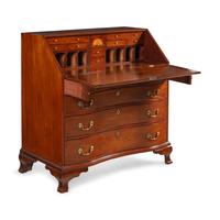 A Chippendale Walnut Serpentine Slant-Front Bureau