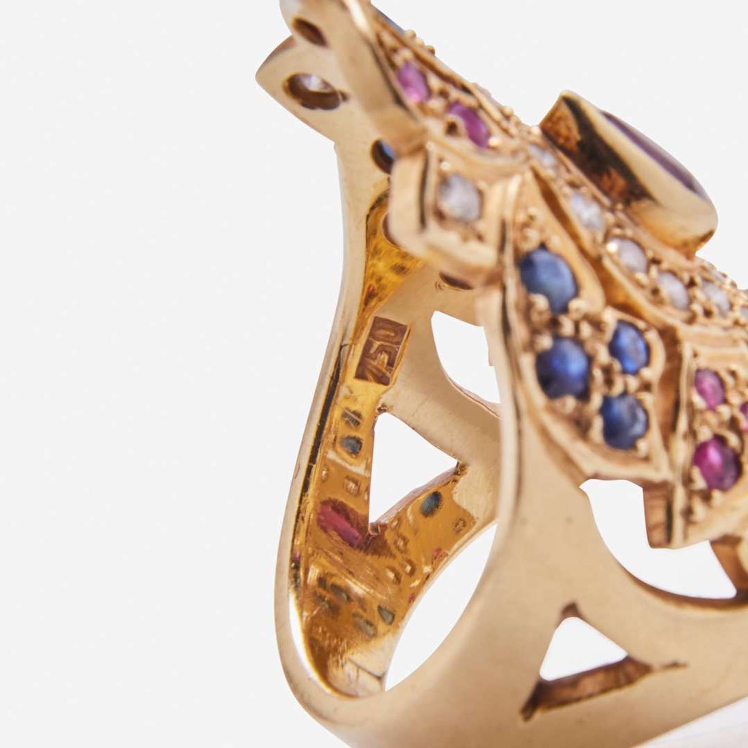 An 18K Yellow Gold and Gemstone Ring