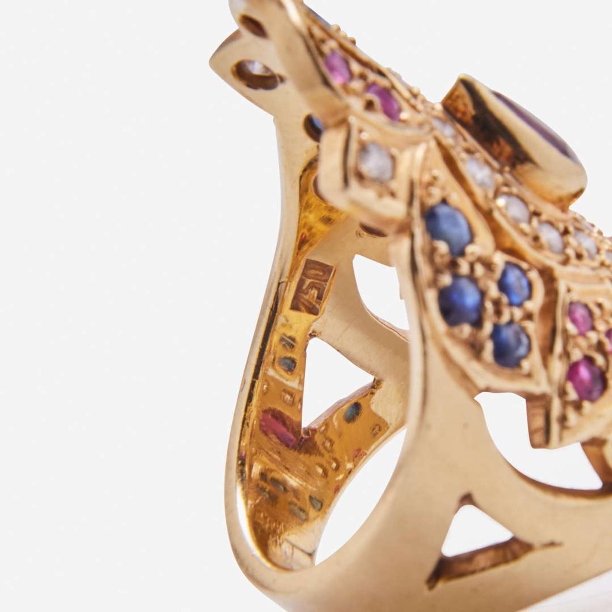 An 18K Yellow Gold and Gemstone Ring