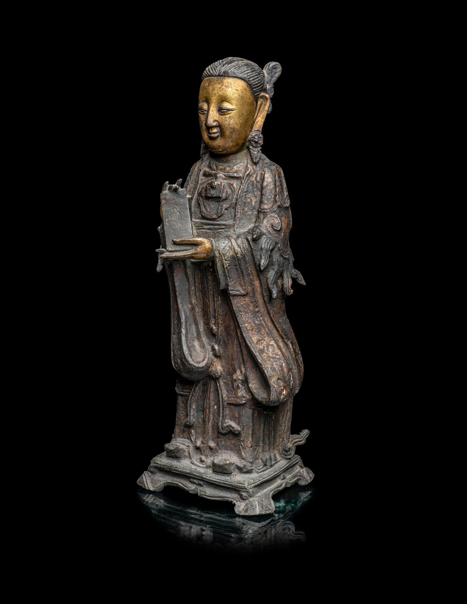 A Chinese Parcel-Gilt Bronze Figure of a Daoist Immortal, Longnv