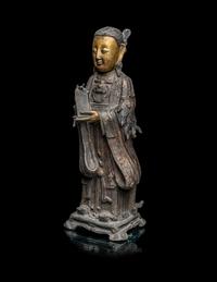 A Chinese Parcel-Gilt Bronze Figure of a Daoist Immortal, Longnv
