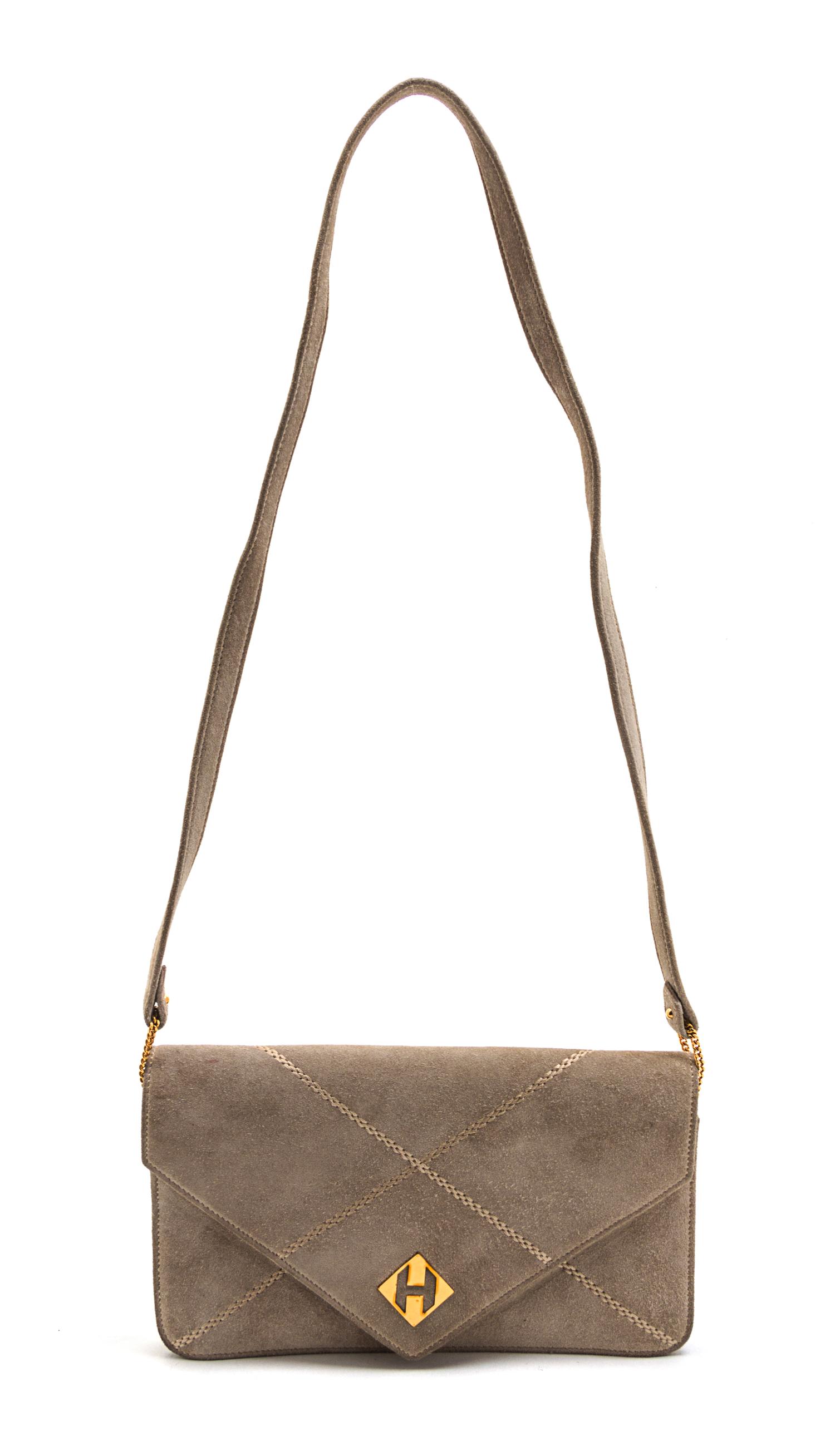 An Hermes Taupe Suede Versailles Bag, 8 1/2 x 5 x 1 inches.