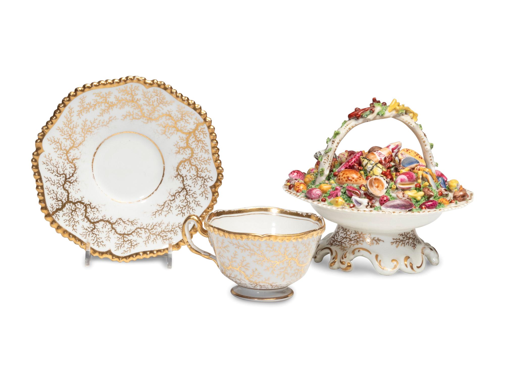A Worcester Porcelain 'Shell-Encrusted' Basket, Cup and Saucer