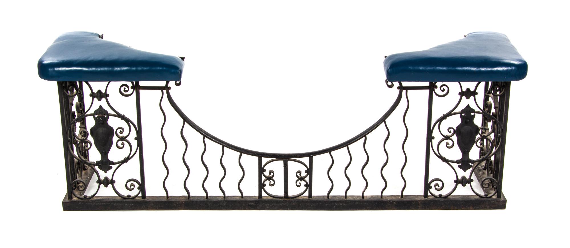 An Iron and Leather Club Fender, Height 24 x width 68 inches.
