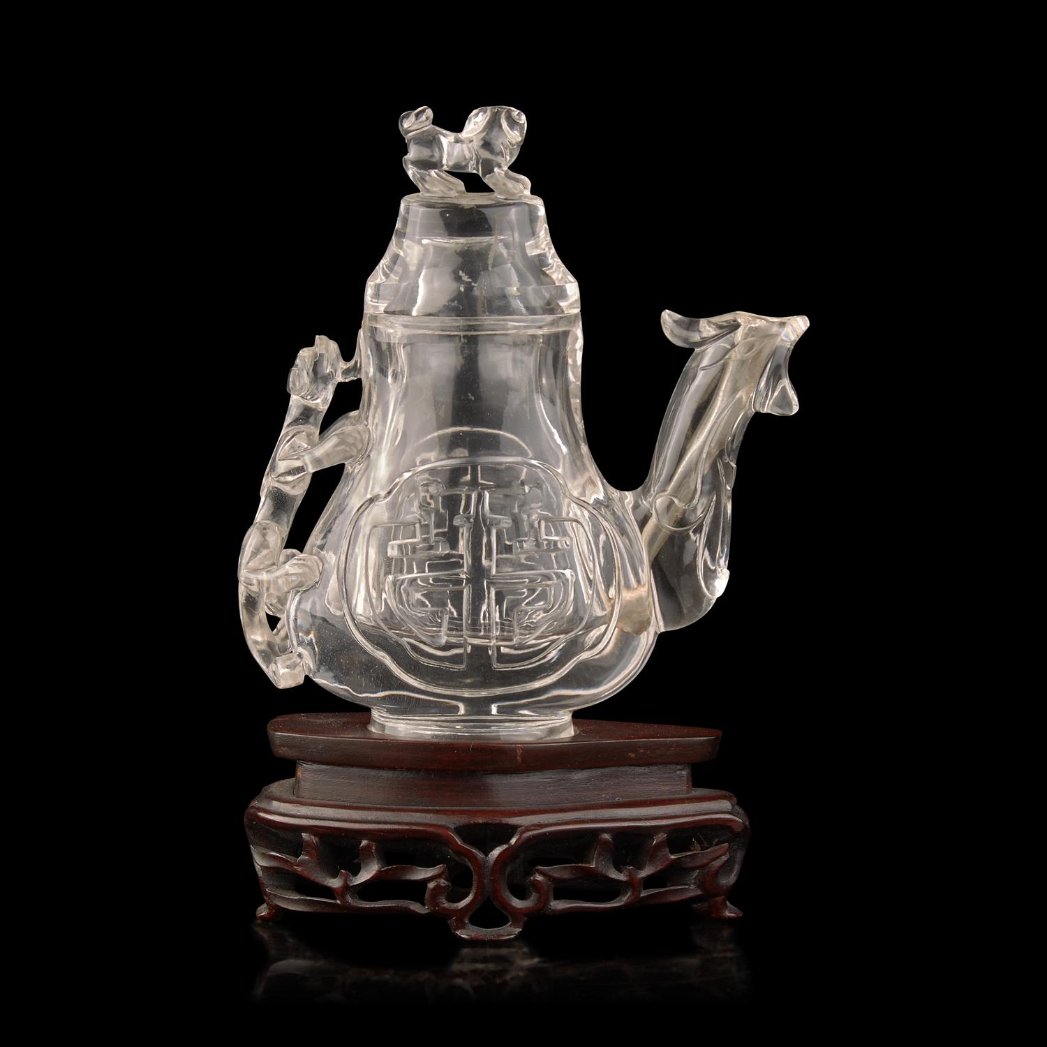 A Chinese Rock Crystal 'Phoenix' Ewer-Form Vase and Cover, 20th Century 近代 雕水晶鳳形蓋瓶
