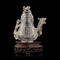 A Chinese Rock Crystal 'Phoenix' Ewer-Form Vase and Cover, 20th Century 近代 雕水晶鳳形蓋瓶