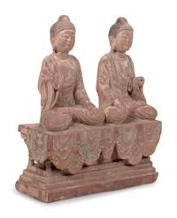 Two Chinese Carved Stone Seated Figures on a Rectangular Base with Remnants of Polychrome Decoration