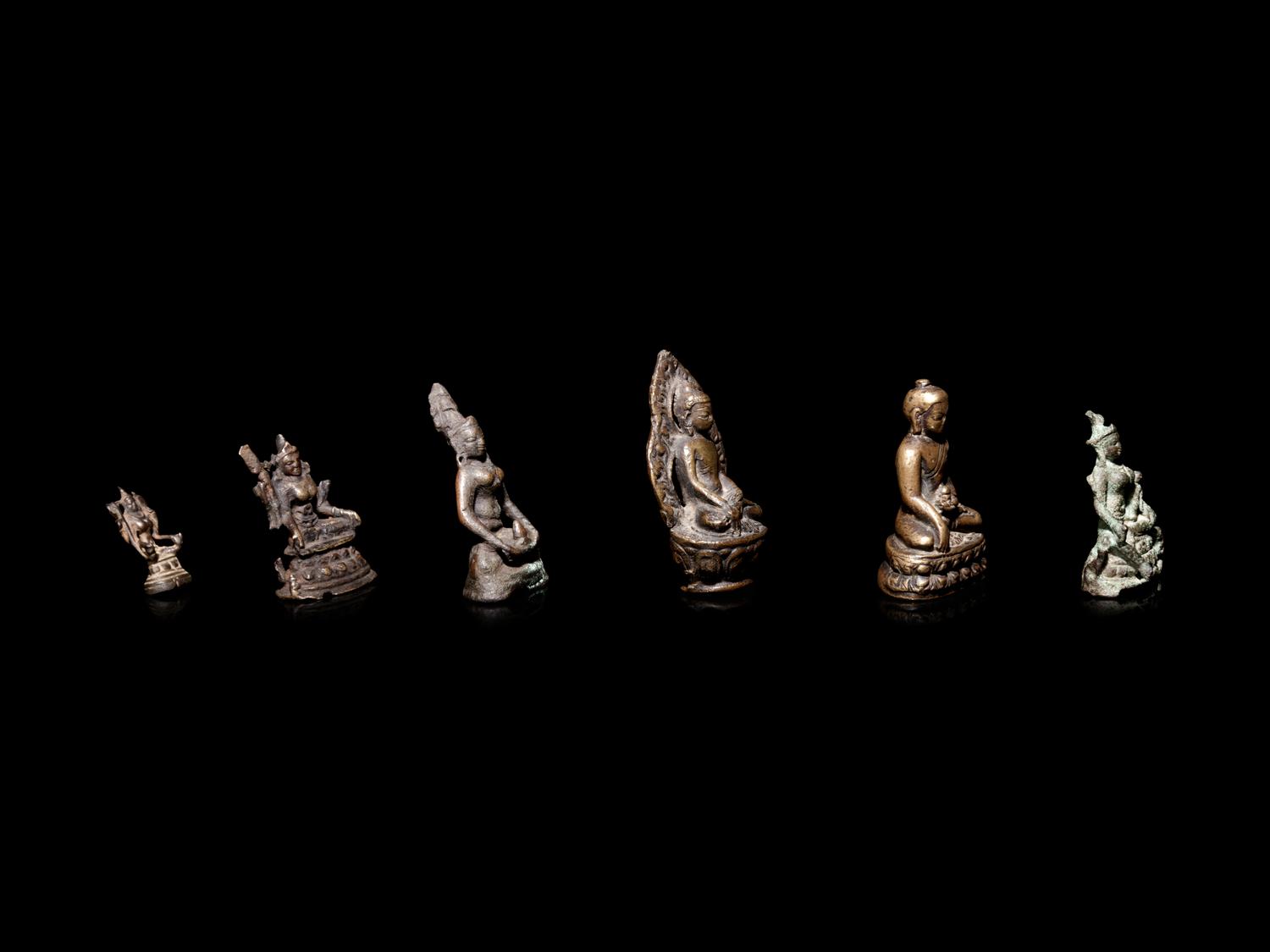 Six Small Tibetan and Southeast Asian Bronze Figures of Deities