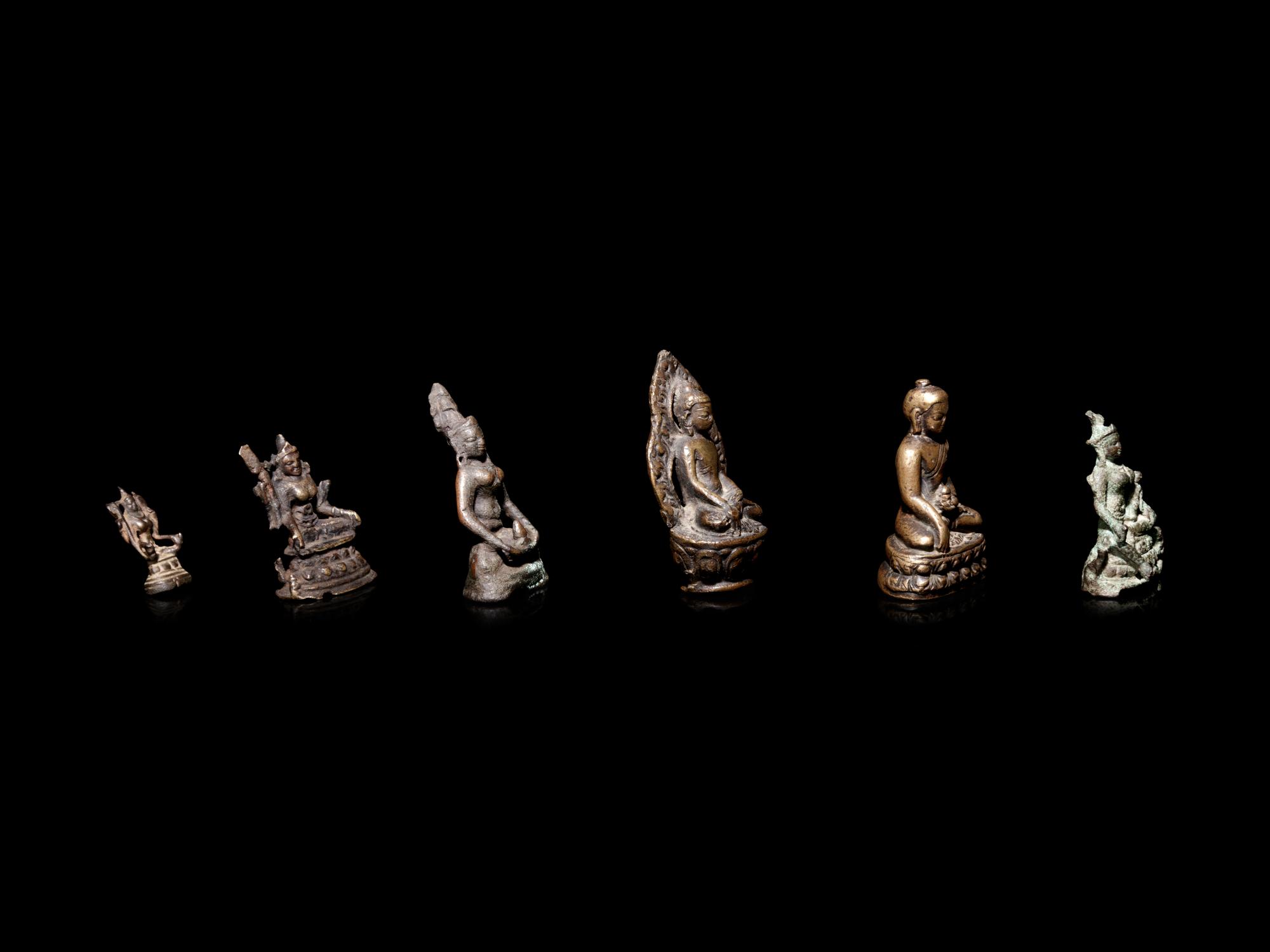 Six Small Tibetan and Southeast Asian Bronze Figures of Deities