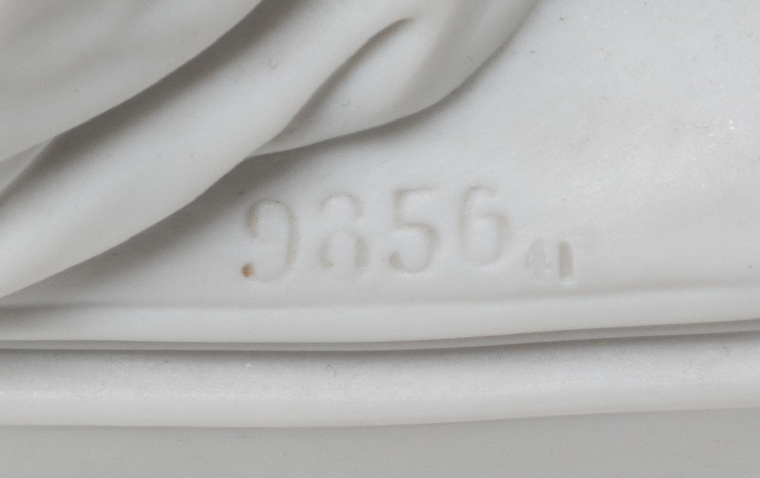 A German Bisque Porcelain Figural Group