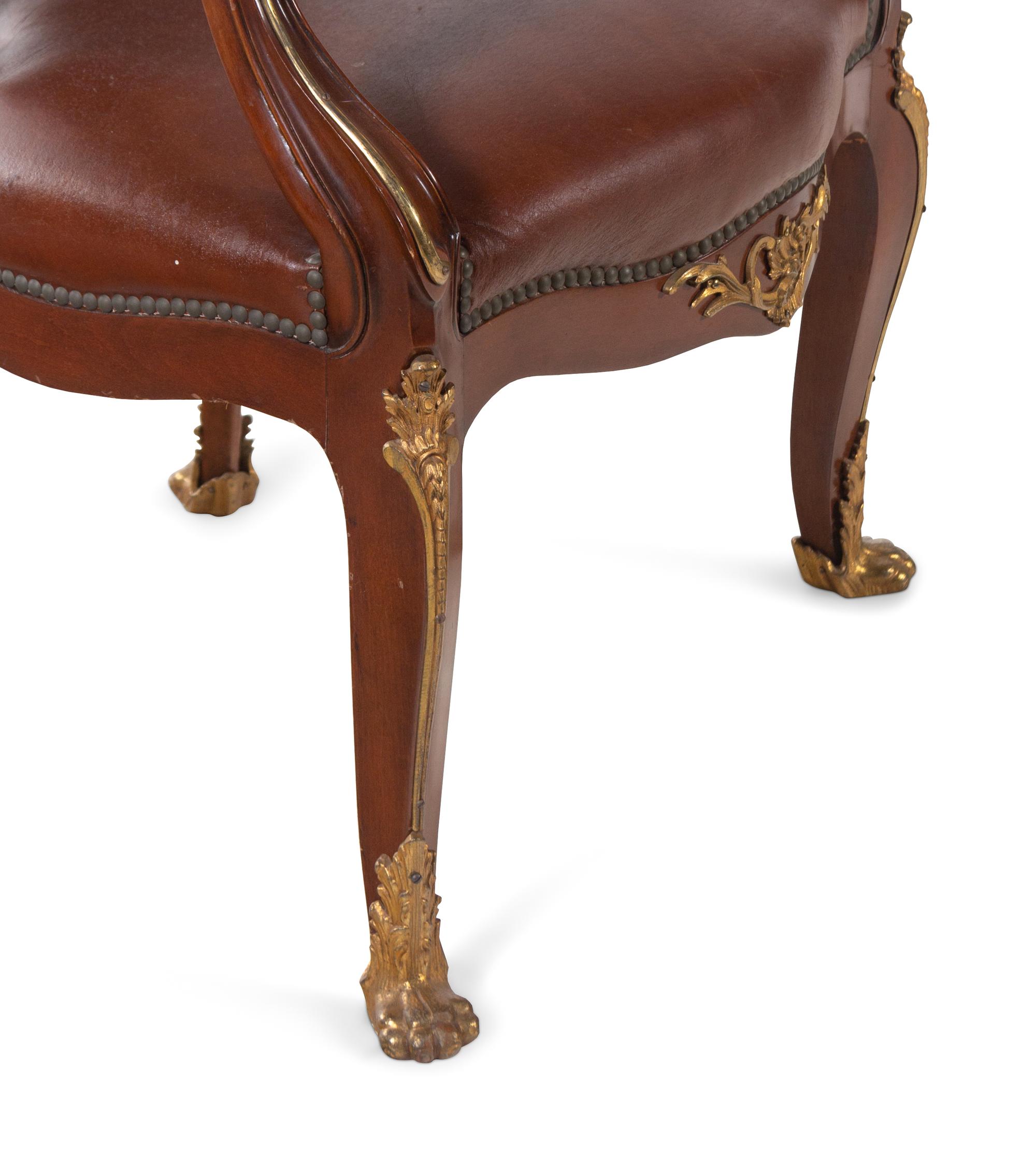 A Set of Fourteen Louis XV Style Gilt Bronze Mounted Walnut Dining Chairs