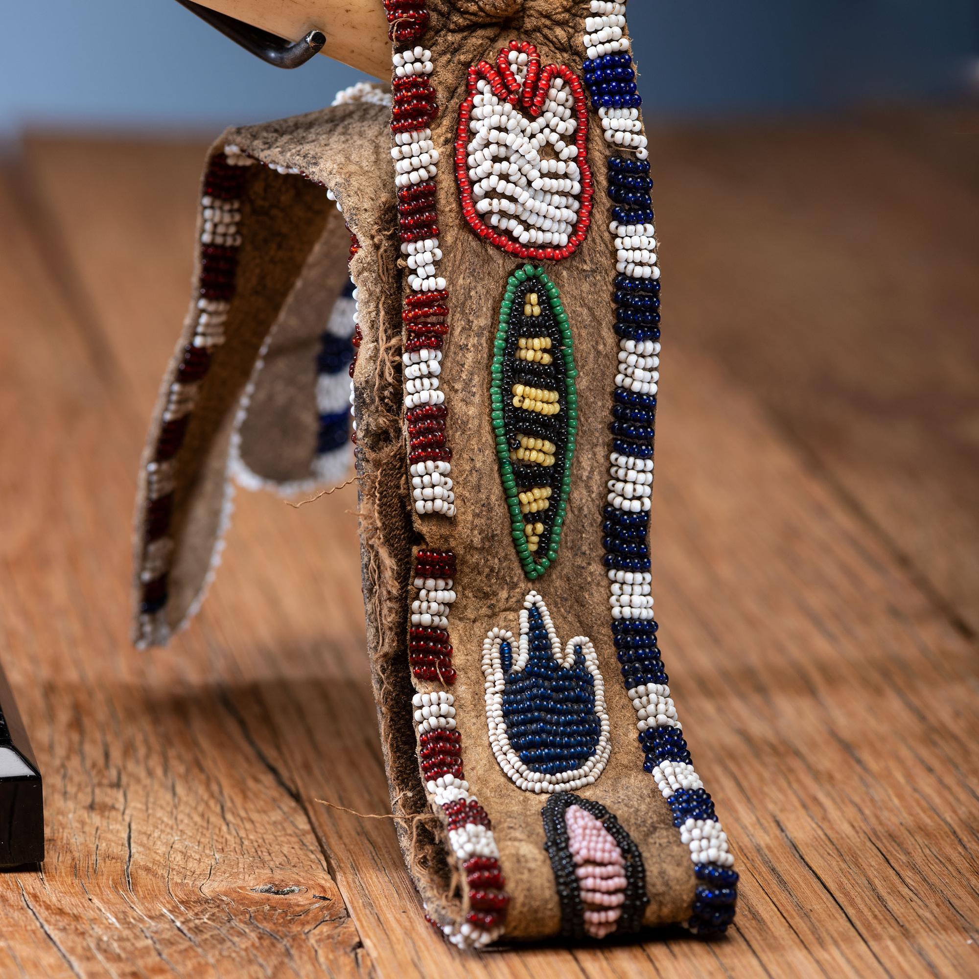 Kiowa Decorated Antler Quirt, with Buffalo Hide Wrist Strap