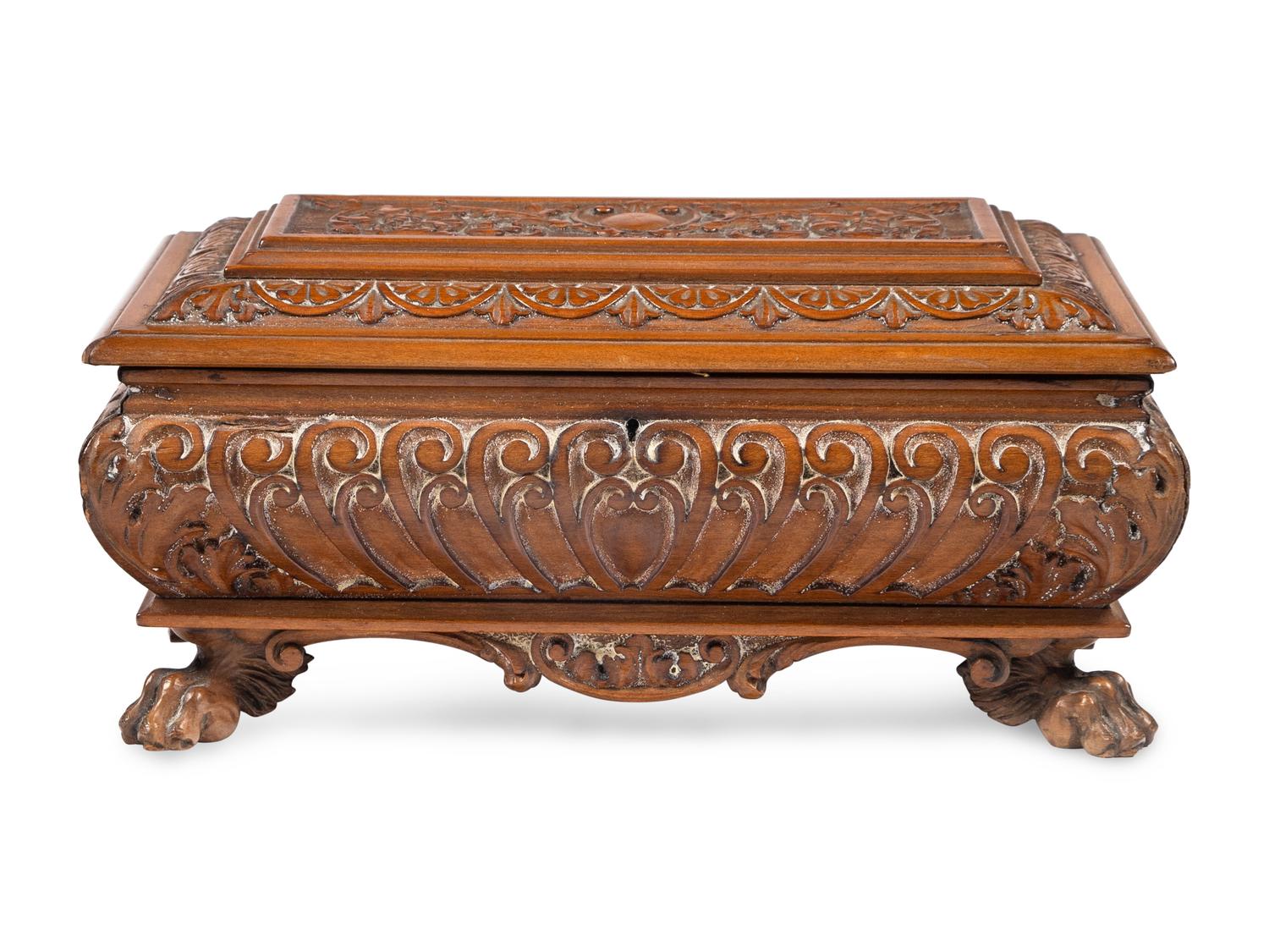 An Italian Carved Walnut Miniature Cassone or Table Casket