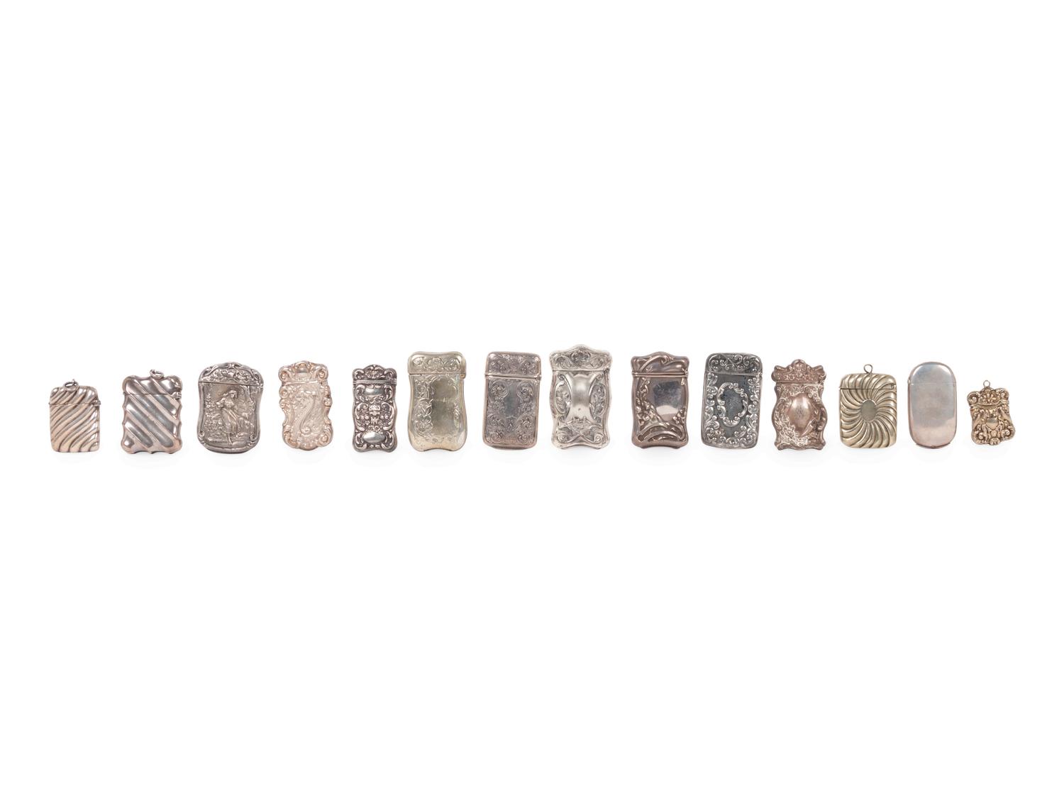 A Group of Fourteen Silver Match Safes