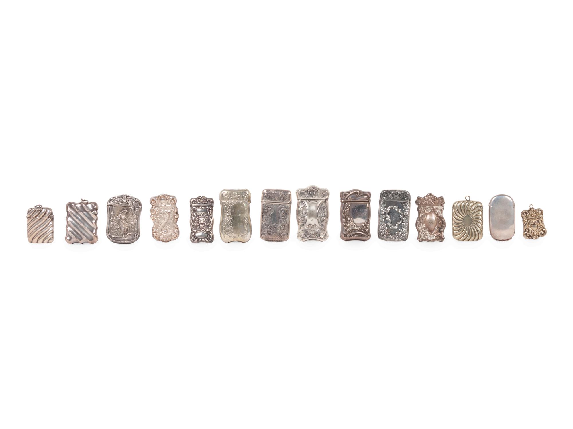 A Group of Fourteen Silver Match Safes